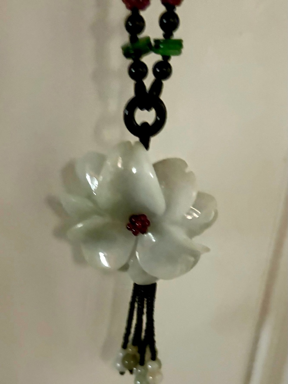 White Flower Pendant Necklace with Red Accent and Black Cord